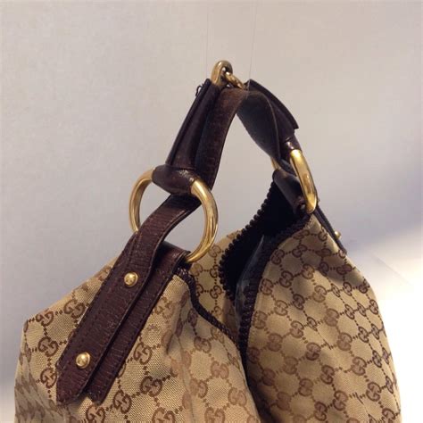 gucci borsa 1500 trapezio monogram tela|Gucci purses for women.